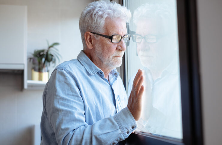 Melancholic and pensive bearded senior man looking into the dist Boredom Unlocks Your Creative Peak